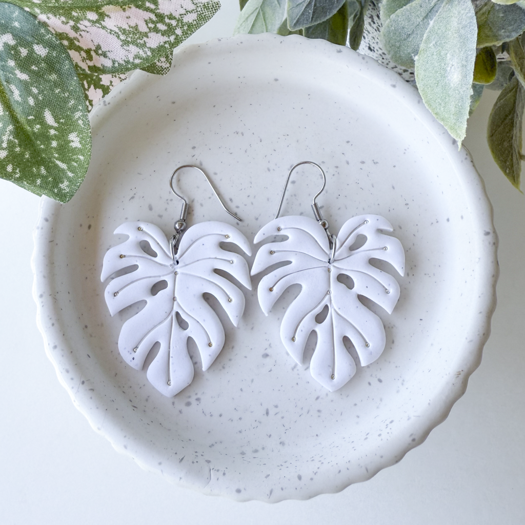 Embellished large monsteras, speckled white